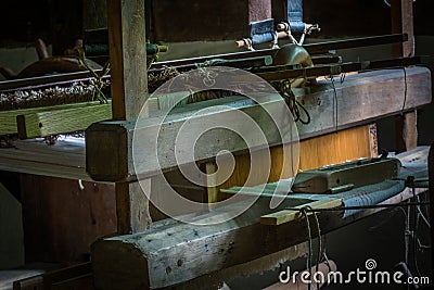 The old and ancient loom in a room Stock Photo