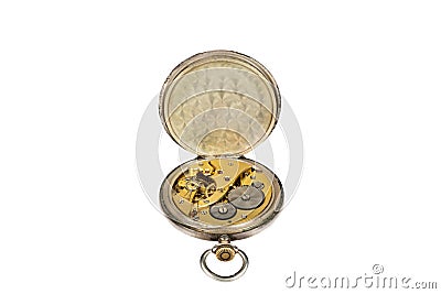 Old antique mechanical golden steel pocket watch with open lid isolated on white background. Stock Photo