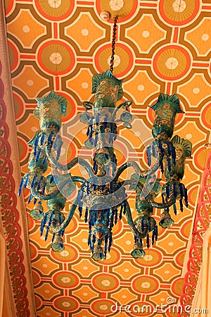 Old antique ornamental blue lamp set in the palace of bangalore. Stock Photo