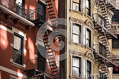 Old apartment building with fire escapes, Manhattan Stock Photo