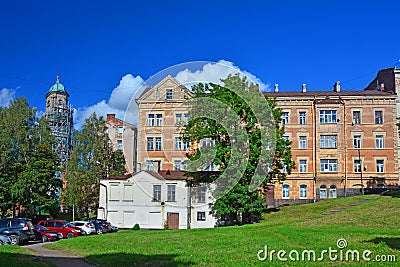 Old apartment houses and Clock tower in Vyborg, Russia Editorial Stock Photo