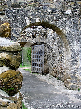 Old arch wooden gate. San Antonio Missions National Historical Park, Texas, USA Stock Photo