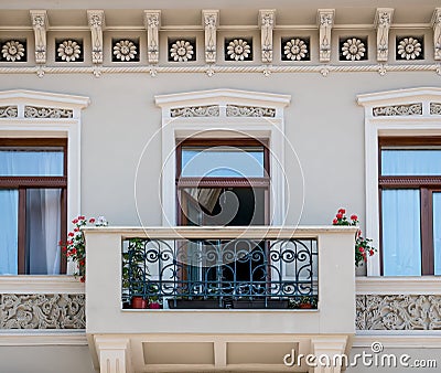 Old architectural detail of a balcony in the center of Brasov, Romania Stock Photo