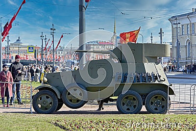 Old armored car fromSecond World War against the background city landscape Editorial Stock Photo