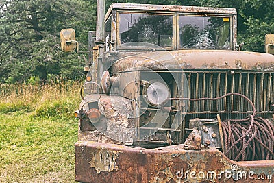 Old army truck in the woods Stock Photo