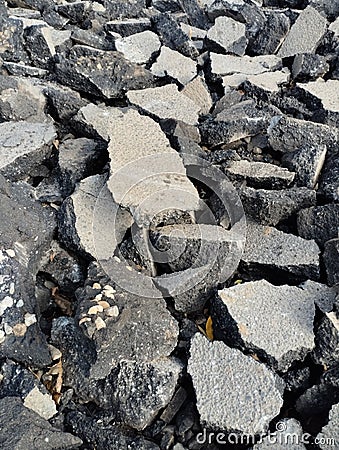 old asphalt, pieces of asphalt, road repairs Stock Photo