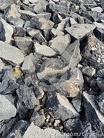 old asphalt, pieces of asphalt, road repairs Stock Photo