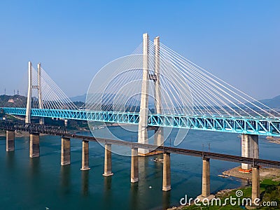 Bird view of Old and New Baishatuo Yangtze River Railway Bridge under blue sky Stock Photo