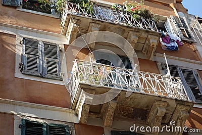 Balconies in arrow street in Corfu town Editorial Stock Photo