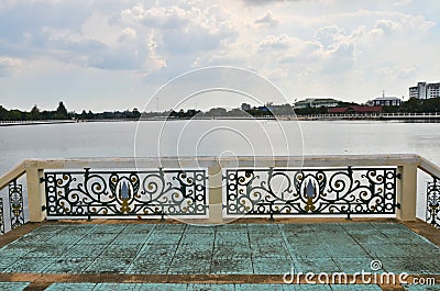 Old balcony with beautiful fence over the lake Editorial Stock Photo