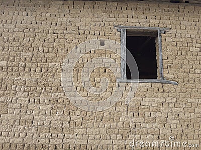 Old Balkan house clay wall. Vintage village clay bricks wall Stock Photo