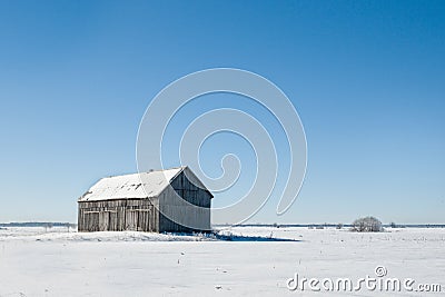 Old barn alone in the winter Stock Photo