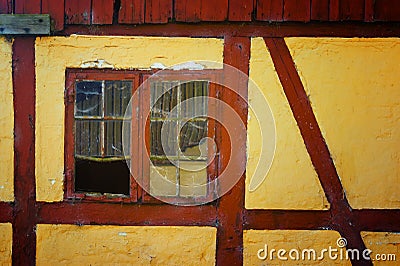 An old barn`s broken window Lolland Denmark Stock Photo