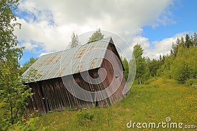 An old barn in Sweden, standing completely askew Stock Photo