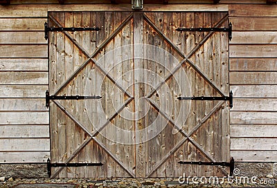 Old barn wooden door with four crosses Stock Photo