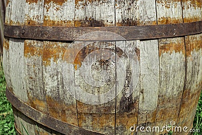 Old barrel with damaged staves Stock Photo