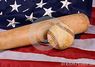 Old Baseball and Bat with American Flag Stock Photo