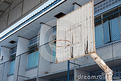 The old basketball hoop in the school. Stock Photo