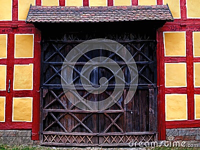 Wooden door of a truss house Stock Photo