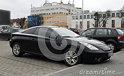 Old but elegant veteran sporting coupe classic newtimer car black Toyota Celica parked Editorial Stock Photo