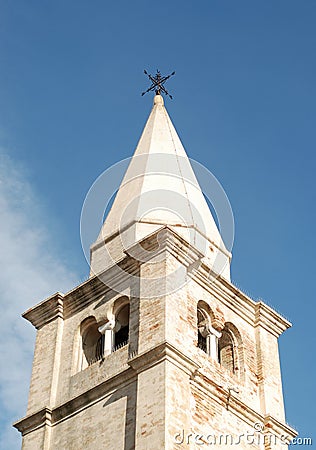 Old belfry tower in Caorle city Stock Photo