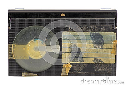 Old betamax video cassette isolated on white background. Vintage video technology. Blank, weathered sticker. Stock Photo