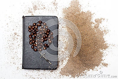 Old Bible, rosary and Cross - Ash Wednesday Stock Photo