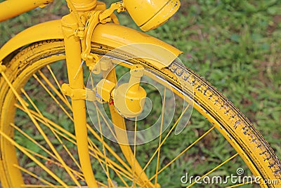 Old bicycle with the bottle dynamo on the front wheel Stock Photo
