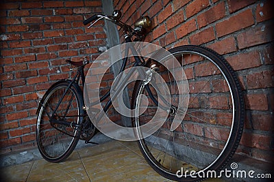 an old bicycle that had been stored for several years in the warehouse Stock Photo