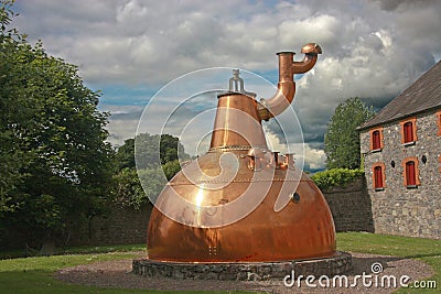 Old big copper whiskey distillery outdoor Stock Photo