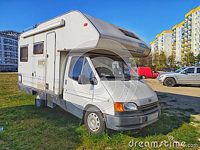 Old Ford camper van parked on grass Editorial Stock Photo