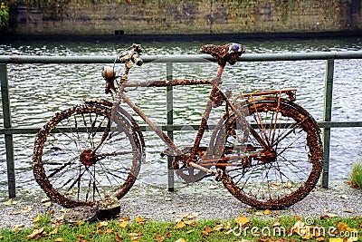 Old bike, full of rust, small clams and barnacles, found in the Stock Photo