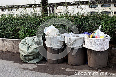 Old Bin trash at rustic countryside wayside, Garbage, Bin, Trash, Dirty, Waste, Pollution garbage, Bin waste Stock Photo