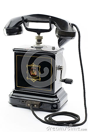 Old black antique telephone with handle Stock Photo