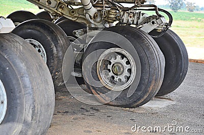 Old black back wheels of an airliner Stock Photo