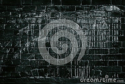 Black brick wall drenched in white paint - dark grunge backgroun Stock Photo