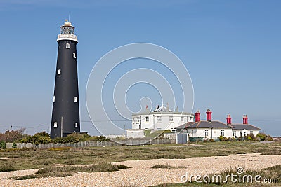 Old black Dungeness Lighthouse Stock Photo