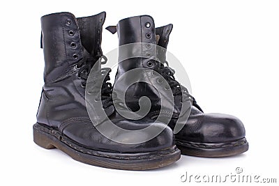 Old black leather work boots Stock Photo