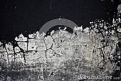Old black paint texture peeling off concrete wall Stock Photo