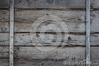 Old black shabby wooden background with rusty metal Stock Photo