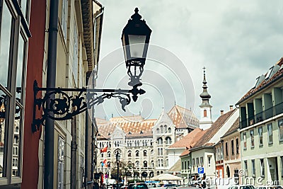 Old black vintage street lapm on the building in Budapest, Hungary. Stock Photo