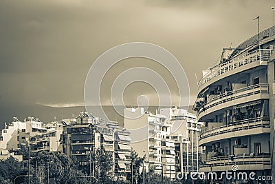 Dark black storm clouds over Greek city panorama Athens Greece Stock Photo