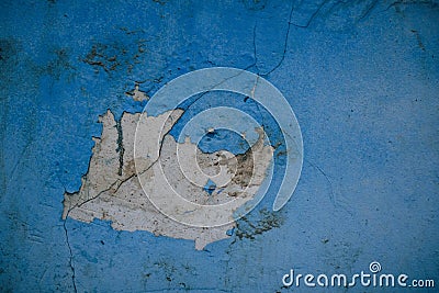 Old blue wall with crumbling plaster and paint Stock Photo
