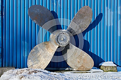 Old boat propeller deteriorate in boat yard Stock Photo