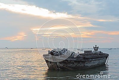 Old boat from wood in the sea Stock Photo