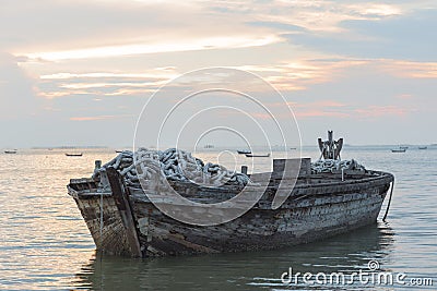 Old boat from wood in the sea Stock Photo