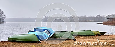Old boats are overturned on the shore. Boat station Stock Photo