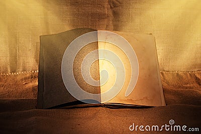 Old book in ambient light Stock Photo