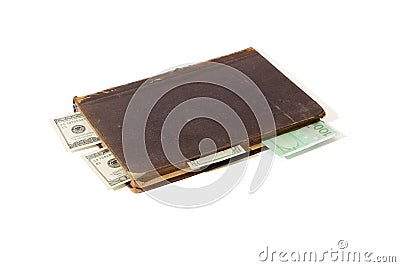 Old book with money bookmarks isolated Stock Photo