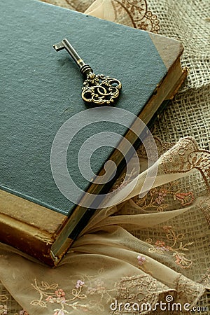 Old book and old key - retro composition Stock Photo